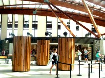 Woman walking through Village Centre at the National Arboretum Canberra