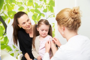 Parent vaccinating child
